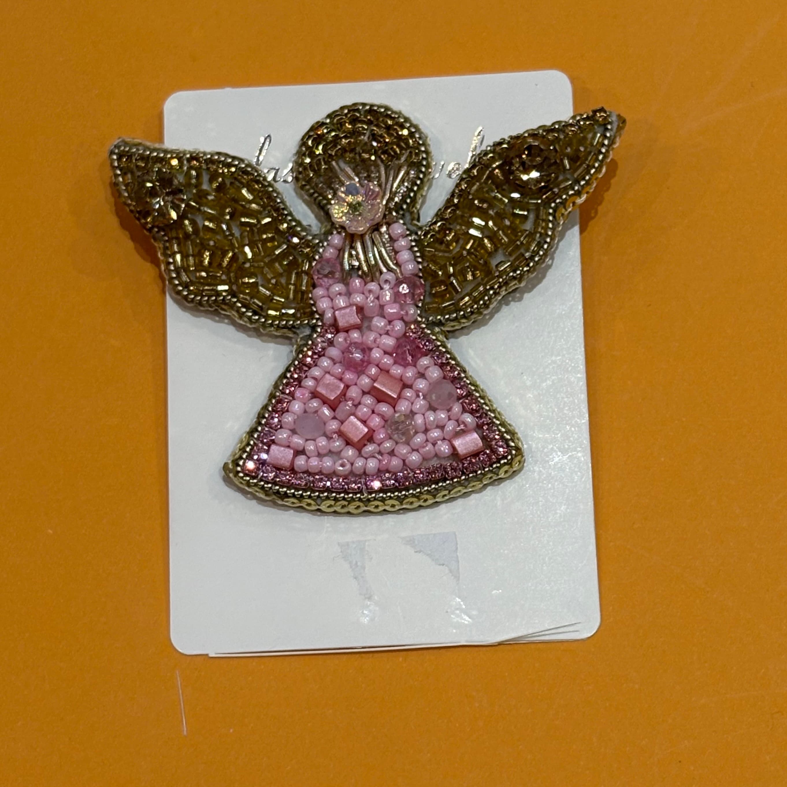 گل‌سینه فرشته صورتی